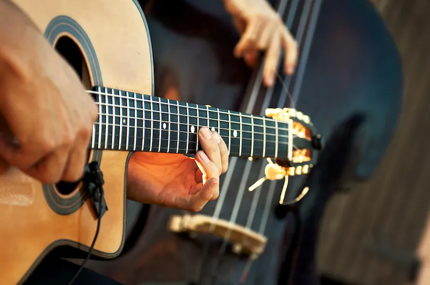 country guitarist playing in a concert